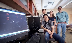 Students and professors in psychology and electrical and computer engineering conduct grasping glove research