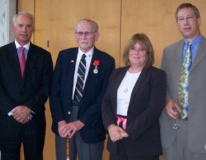 Doug Marvin '79 (L-R), Morris Metz '50, Sue Carras '76, and Doug Metz '79 at the Oct. 19 ceremony at the French Embassy, Washington, D.C.