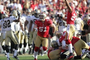 San Francisco 49er Blake Costanzo '06 celebrates after forcing a fumble in the NFL divisional playoff game against the New Orleans Saints.