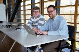 Christopher Jones ’13 and John Fulton work in Skillman Library