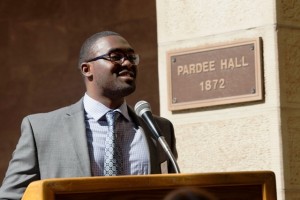 Robert Young '14 speaks at the exhibit opening reception.