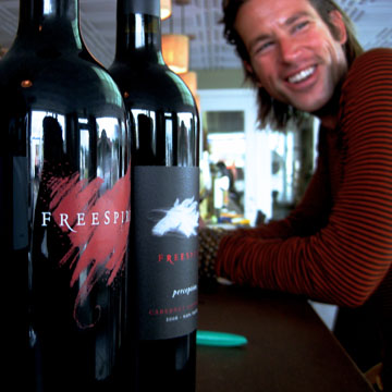 Step Sinatra '98 with bottles of wine produced by one of his companies