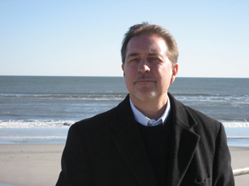 Anthony Wallace '78 on a beach