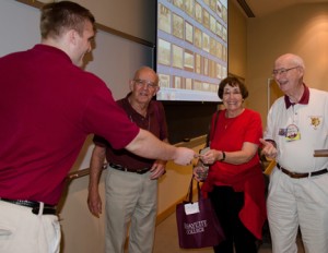 Brad Bormann '14 (left) encourages alumni to contribute their favorite Lafayette-Lehigh memory to the My Rivalry project.