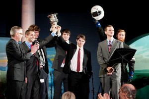 Scott Hummel (far left), Jeffers Director of Engineering, and members of Lafayette's award-winning race car design team discuss the interdisciplinary project.