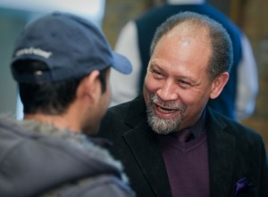 Professor Holton speaks with students during the opening of his exhibit at the Williams Center Gallery last year.