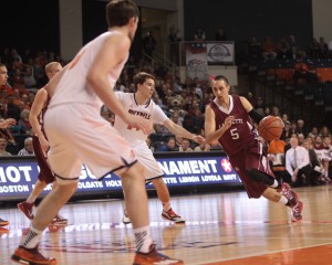 Joey Ptasinski '15 drives toward the basket against Bucknell.