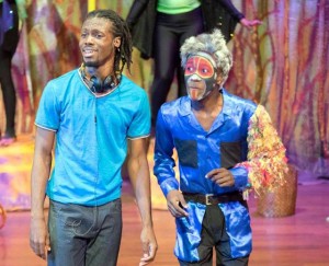 Jovante Anderson ’19 performs on stage in a high school theater production.