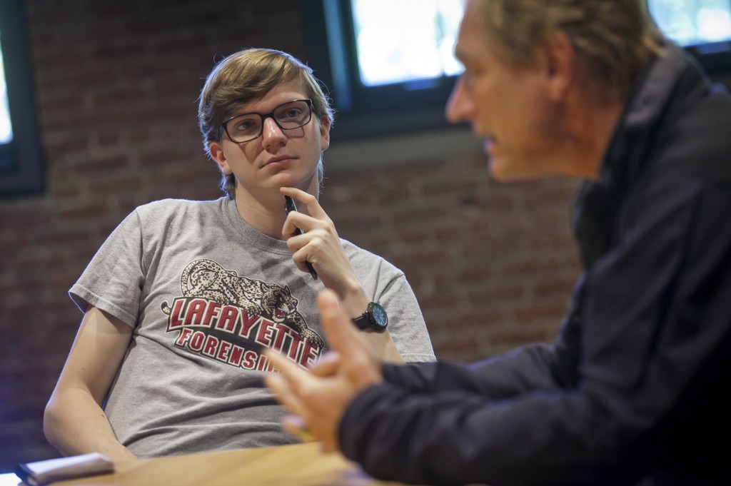 Joseph Rothschild ’16 listens intently to Julian Sands.