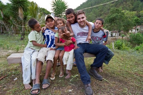 Luke Calvano ’12 with children from El Convento