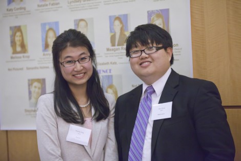  Miao Wang '12 (left) and Shiyang Jiang '12 greeted attendees.