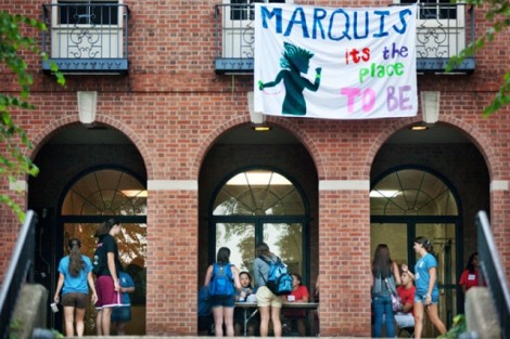 Student Leaders hand out welcome packets at Marquis Hall.