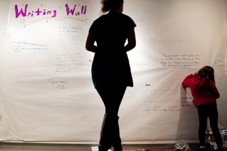 Students write on the 