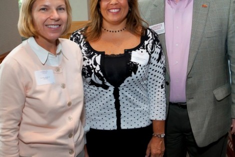Carol Rowlands, left, associate dean of admissions and financial aid for operations and research, and Greg MacDonald, right, dean of admissions and financial aid, present the New AAR of the Year Award to Angela Garofalo '82, who accepted the award for her daughter Marie A. Garofalo ’10.