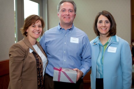 Beth Nelson, left, vice president for development and alumni affairs, and Pamela Gaary Holran ’88, right, president of the Alumni Association, present Stephen H. Konya '96 with the Mayfield Award.