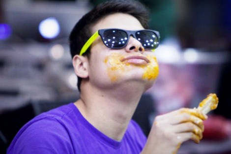 A student catches his breath during the mountain hawk wing-eating competition.