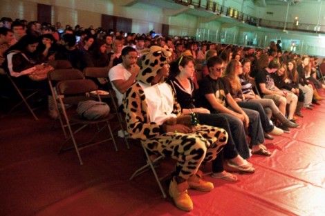 Students listen to comedian Myq Kaplan.