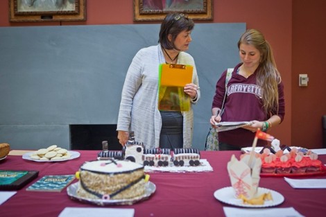 Julia Ben-Asher '14, right, a reporter for the Lafayette newspaper, interviews Diane Shaw, director of special collections and College archivist, for an article about the event.
