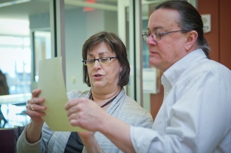 Diane Shaw, director of special collections and College archivist, and Bob Duncan, integrated technologies librarian, tabulate the votes. 