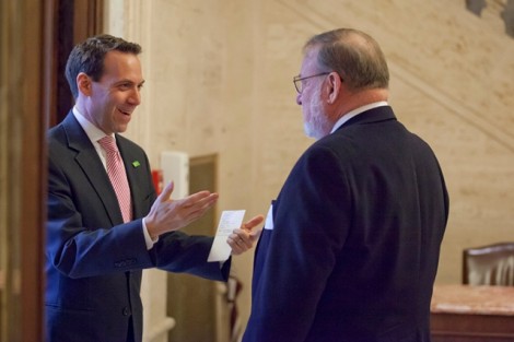 Alan Hoffman '88, Vice President Biden's deputy chief of staff, greets his former professor, James Lennertz, associate professor of government and law.