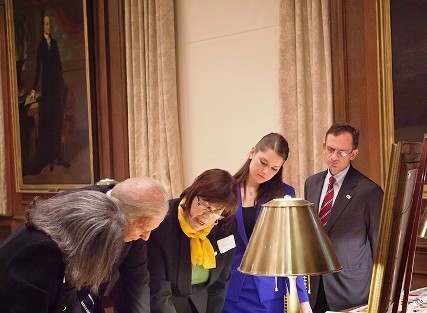 Leslie Muhlfelder, vice president for human resources and general counsel, l-r; Vice President Joe Biden; Diane Shaw, director of special collections and College archivist; Caroline Lang '13, Student Government president; and President Daniel H. Weiss look over records about Biden's ancestors who attended Lafayette at Kirby Library.  