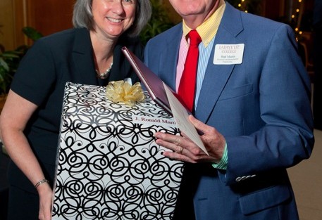 Provost Wendy Hill with J. Ronald Martin, who is retiring as professor of chemical and biomolecular engineering