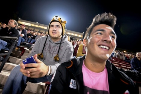 Andrew Alikhani '15, left, and Kevin Iraheta '15 watch the game.