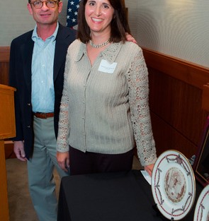 Pamela Gaary Holran '88 is presented with the Bell Award by President Daniel H. Weiss.