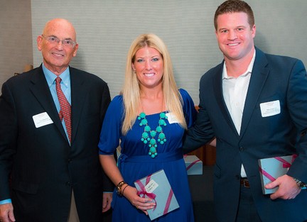 David Reif '68 (left), president of the Alumni Association, presents Lauren Fisher '07 and Matt Potter '07 with the Mayfield Special Commendation Award.