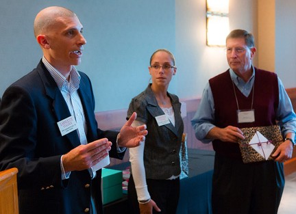 John Weis '62 (far right) receives Smith '94 Award from Joe Samaritano '91, director, and Elizabeth Anderson, assistant director, of the Annual Fund.
