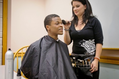 Applying makeup before going on air