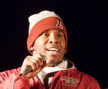 Football co-captain Darius Safford ’13 addresses the crowd at the Pep Rally. 
