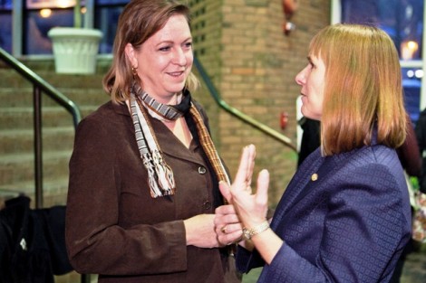 Mary Wilford-Hunt, left, director of facilities planning and construction, meets Alison Byerly.