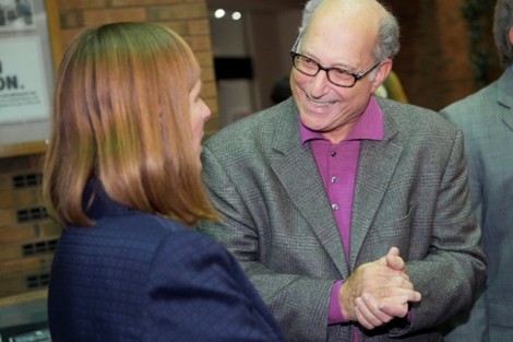 The president-elect introduces herself to Robert Weiner, Jones Professor of History.
