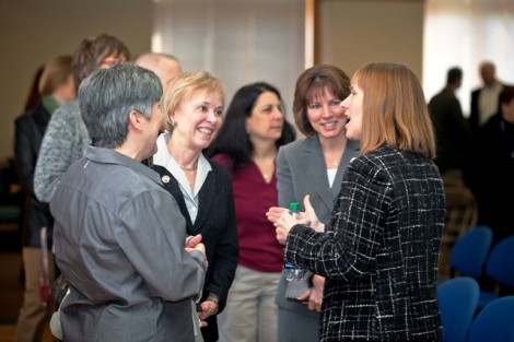 Alison Byerly meets with staff and administrators. 