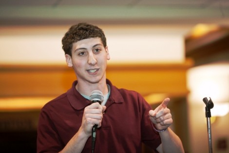 Evan Gooberman '13, president of Hillel and a member of the Presidential Search Committee, speaks to the students gathered in Farinon Center. 