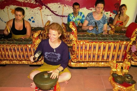 Katie Zeikel '15, l-r, Professor Jennifer Kelly, Derek Vill '14, Professor Mary Jo Lodge, and Savannah Sargent '13 try out their musical  skills in a gamelan ensemble.