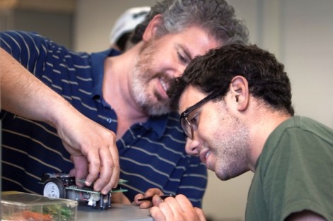 John Bloore '15 makes some adjustments to his team's robot. 