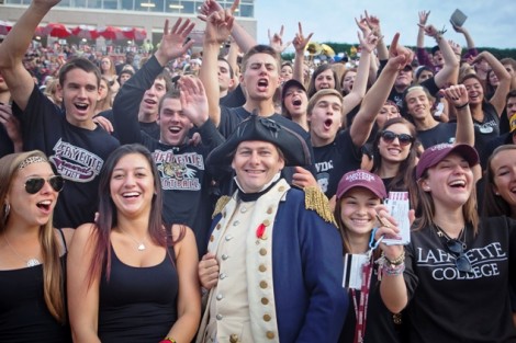 The Marquis de Lafayette greets people in the stands.