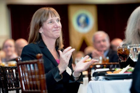 President Alison Byerly laughs at a joke during the inaugural luncheon.