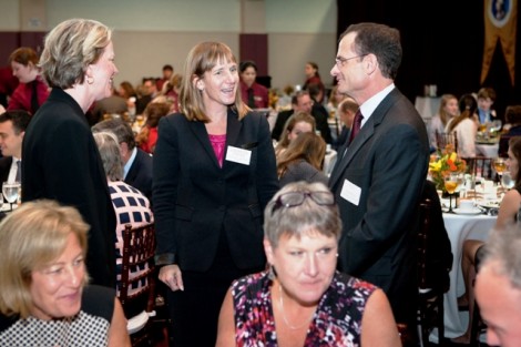 President Byerly speaks with former President Dan Weiss and Sandra Jarva Weiss.