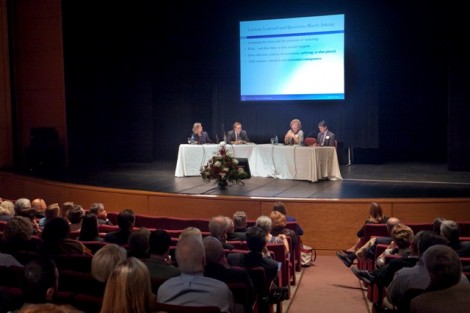 The panel discusses 'New Models for Higher Education.'