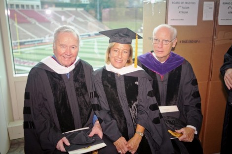 Charles Hugel ’51, former chair of the board, Trustee Barbara Levy ’77, and Alan Griffith ’64, former chair of the board, relax during the robing ceremony.