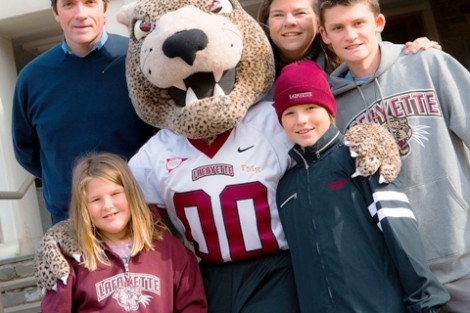 Scott Baker '17 (right) and his dad, also Scott, mom, Emma, sister, Allison, and brother, Luke, pose with the Leopard outside Farinon Center.
