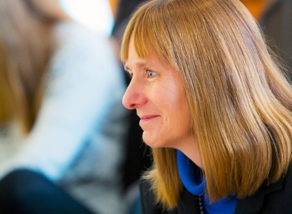President Alison Byerly listens to the students' remarks.