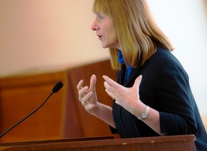 President Alison Byerly addresses students and families. 