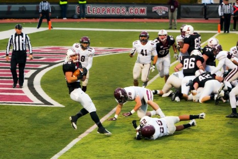 Running back Ross Scheuerman ’15 scores a touchdown.