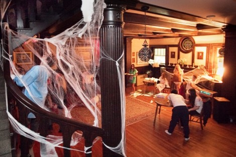Asylum patients wander around the house. 