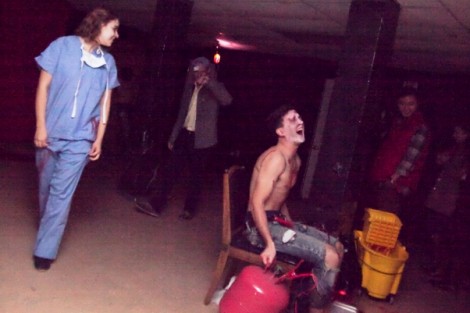 Guests make their way through the asylum 'playroom.'