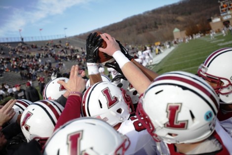 The team gets focused prior to taking the field. 